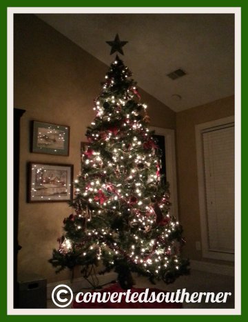 The tree! So much for the ease of the pre-lit tree... I had to make a Target run to buy lights to add to it this year!