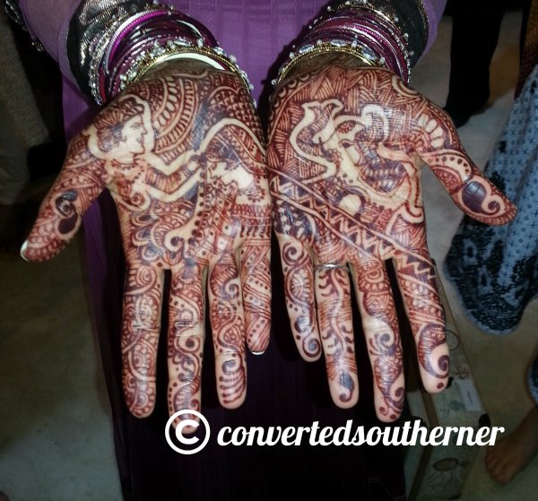 Pinkster's palms with her bridal henna