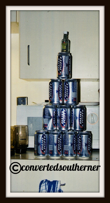 Bud Light beer can Christmas tree, with a mini bottle as a topper