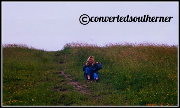 That is me, falling on my ass, coming down the muddy hill in Nuremberg, Germany. Study Abroad, 1999.