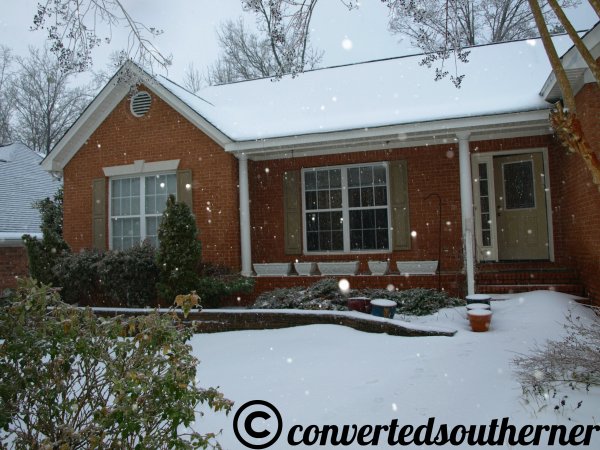 Snow falling in the South, on the house