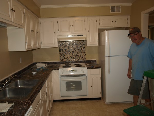 new cabinets and counter and back splash 