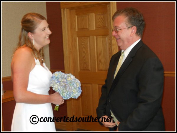 The bride getting advice from her Dad