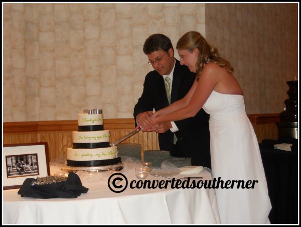 Gail and Puff cutting the cake