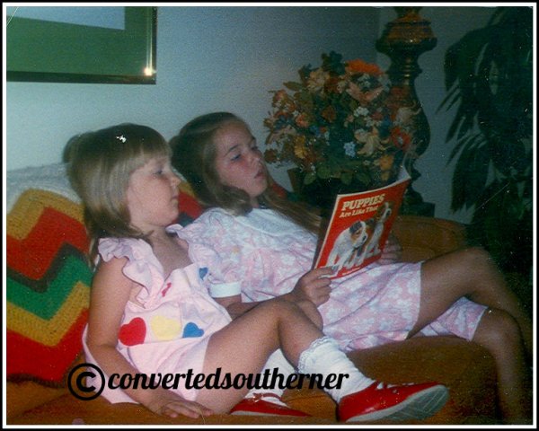 Jenna on the left, me on the right reading to her. July 1989