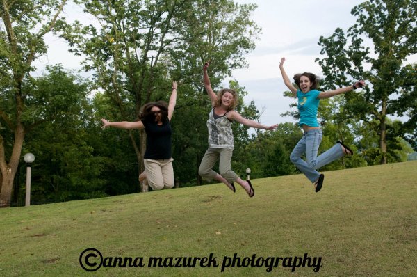 Jumping like the fools we are outside the Vulcan statue in Birmingham, AL. July 3, 2008
