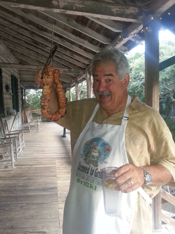 My Uncle Bri at the beach house. Grill Master!