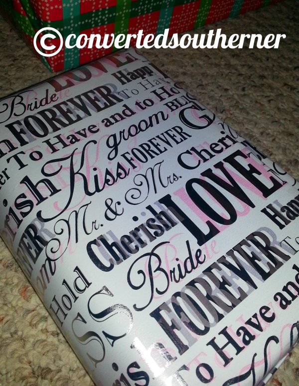 And bless my sweet father's heart, he saw wrapping paper and went for it... never noticing it was wedding paper and not Christmas paper. 